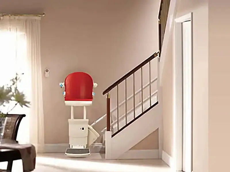 Freedom Curved Stairlift CP with perch seat on a curved staircase