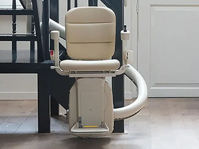 Freedom Curved Stairlift CS3 single rail stairlift on a curved staircase