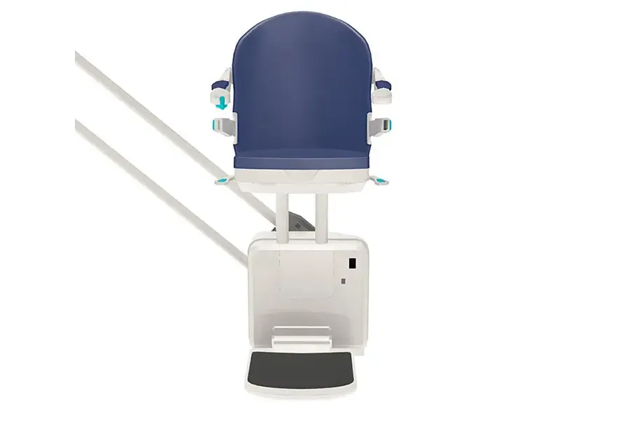 A Freedom Stairlifts Curved Stairlift in a perch seat with blue upholstery.