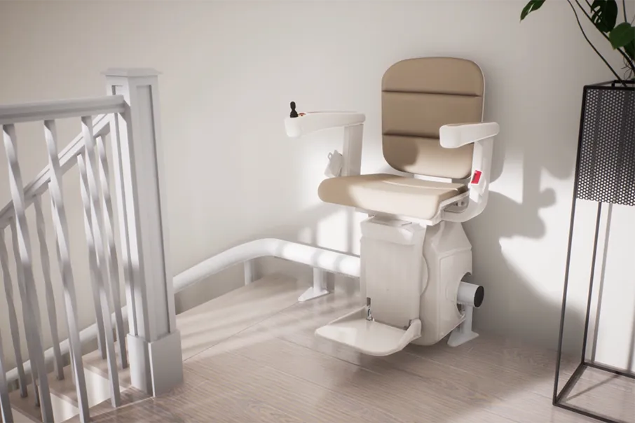 A Freedom Stairlifts single track curved Stairlift 3 with natural colour upholstery and a top overrun onto the landing of one metre.